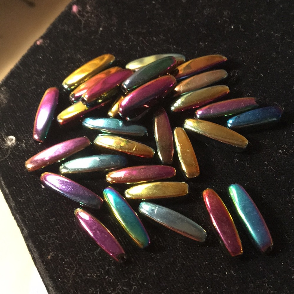 Unique color elongated beads .